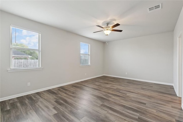 5635 Oak Trace Dr, Saint Gabriel, LA 70776 - spare room featuring ceiling fan, wood finished floors, and baseboards