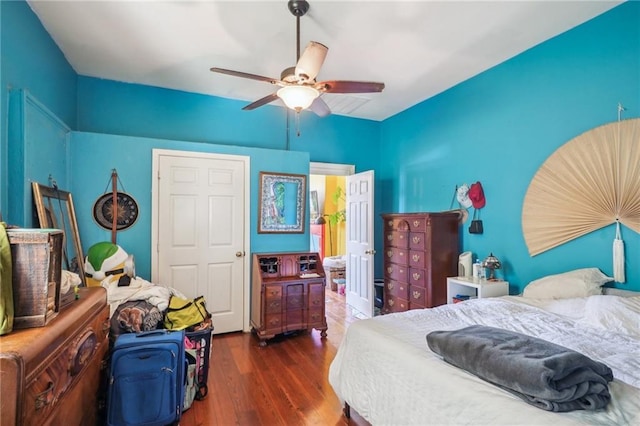 bedroom with ceiling fan and wood finished floors