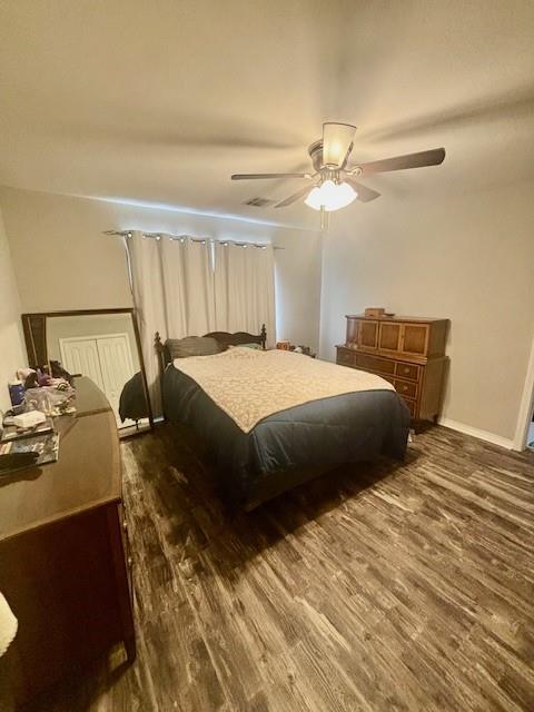209 Legrande Bayou Ln, Kenner, LA 70065 - bedroom with visible vents, ceiling fan, baseboards, and wood finished floors