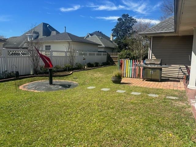 209 Legrande Bayou Ln, Kenner, LA 70065 - view of yard featuring a patio area and a fenced backyard