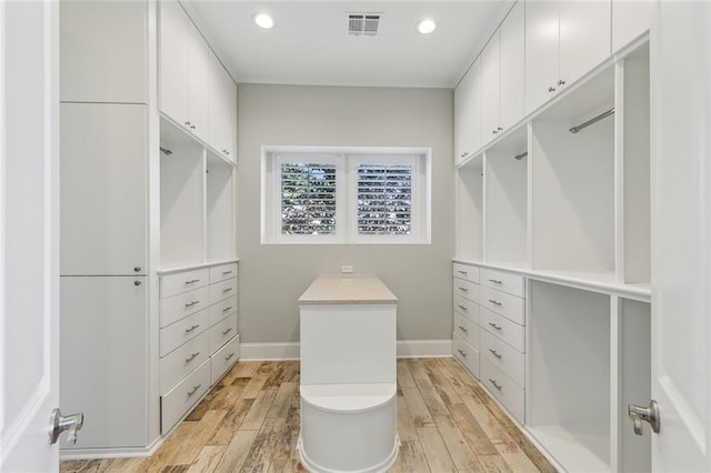 spacious closet with visible vents and light wood finished floors