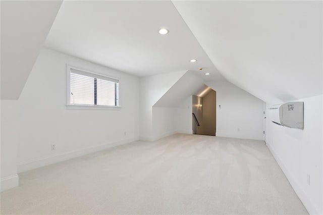 bonus room with light carpet, recessed lighting, baseboards, and lofted ceiling