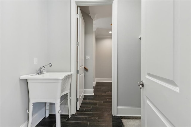 bathroom featuring wood tiled floor and baseboards