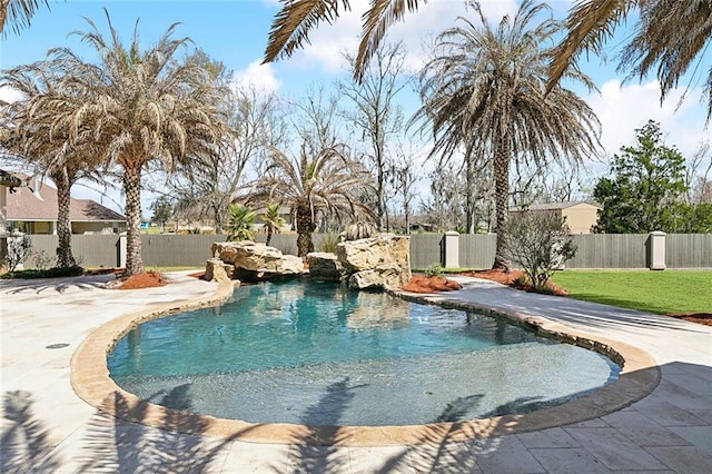 view of pool featuring a yard, fence private yard, and a fenced in pool