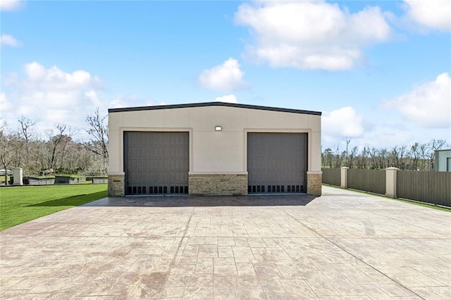 detached garage with fence