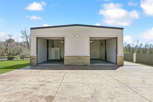 detached garage with fence