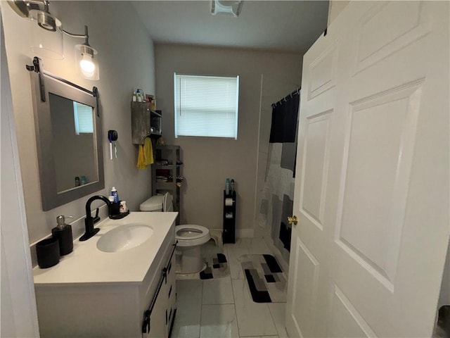 bathroom featuring toilet, curtained shower, tile patterned flooring, and vanity