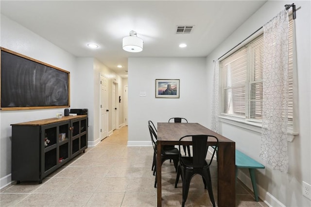 dining room featuring light tile patterned floors, recessed lighting, visible vents, and baseboards