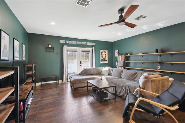 living area featuring a ceiling fan, visible vents, wood finished floors, and french doors