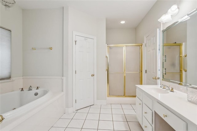 bathroom with tile patterned flooring, a shower stall, a bath, and vanity