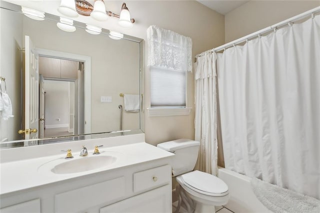 full bathroom with vanity, toilet, and shower / tub combo with curtain