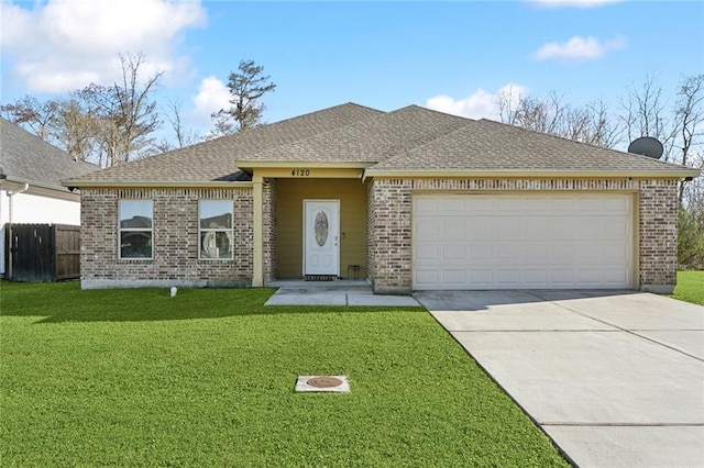 single story home with brick siding, roof with shingles, an attached garage, driveway, and a front lawn