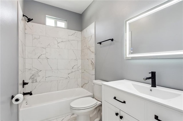 bathroom featuring toilet, marble finish floor, bathtub / shower combination, and vanity