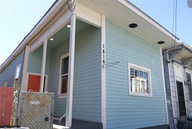 view of property exterior with fence