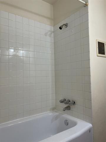 full bathroom featuring shower / washtub combination and visible vents