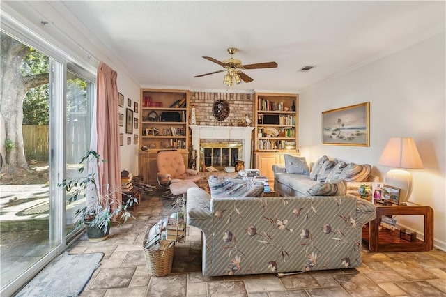 108 Bertel Dr, Covington, LA 70433 - living room with a ceiling fan, stone tile flooring, ornamental molding, and visible vents