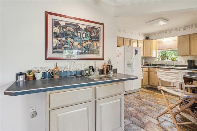 108 Bertel Dr, Covington, LA 70433 - kitchen with a sink, dark countertops, and white fridge with ice dispenser