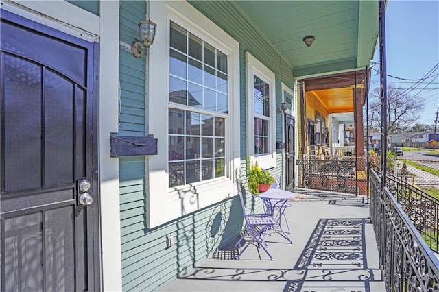 view of patio featuring a porch