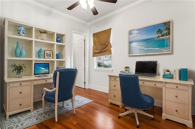 office space with baseboards, a ceiling fan, dark wood finished floors, and crown molding