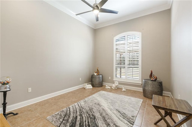 interior space featuring a ceiling fan, crown molding, baseboards, and light tile patterned floors