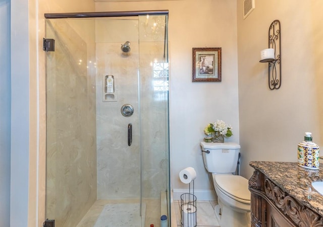 bathroom with visible vents, toilet, a stall shower, vanity, and tile patterned floors