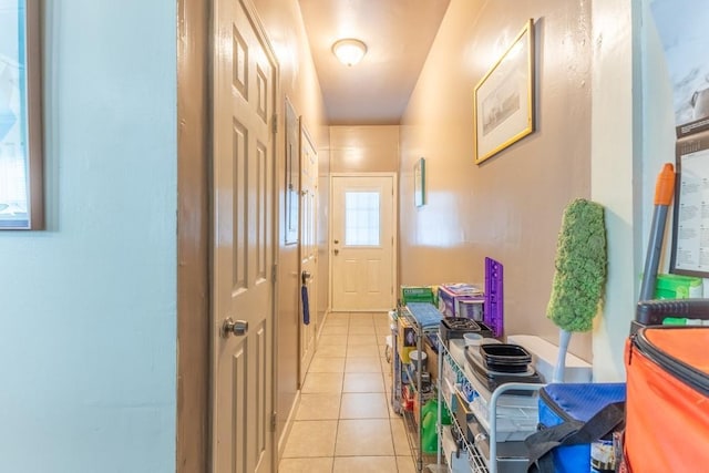 doorway featuring light tile patterned floors