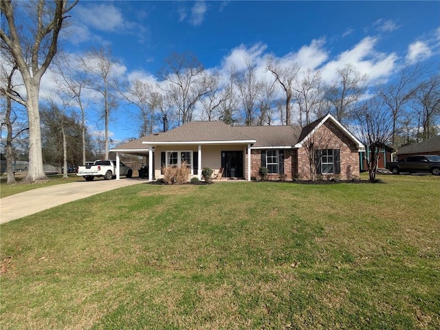 ranch-style house featuring an attached carport, concrete driveway, brick siding, and a front lawn