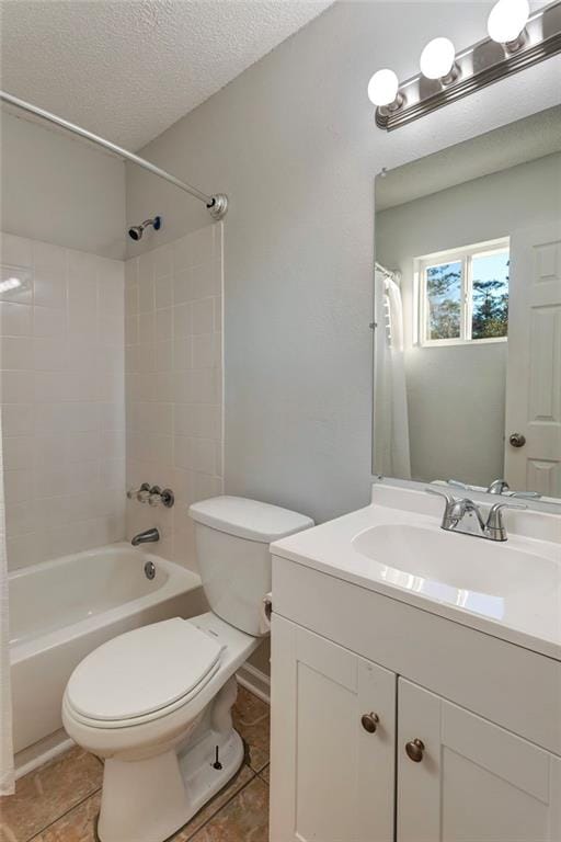 full bath featuring shower / bathtub combination with curtain, toilet, vanity, a textured ceiling, and tile patterned floors