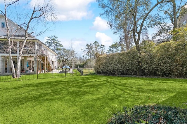 view of yard with fence