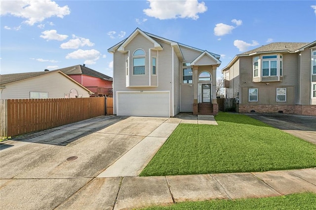 view of front facade with a garage, concrete driveway, a front lawn, and fence