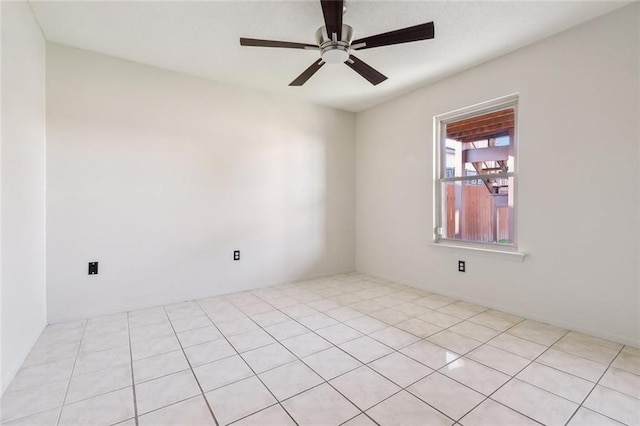 unfurnished room with a ceiling fan