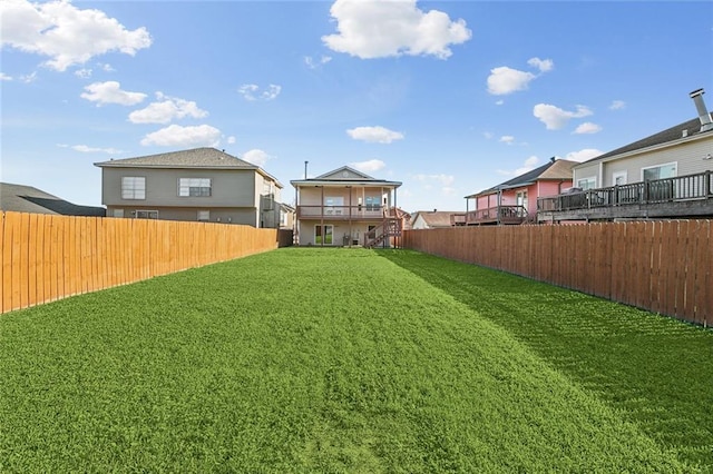 view of yard featuring a fenced backyard