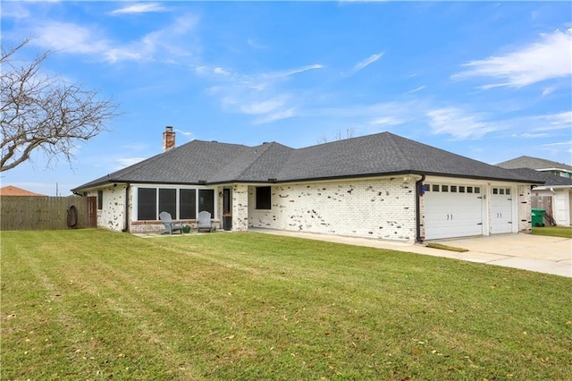 ranch-style house featuring a garage, fence, driveway, a chimney, and a front yard