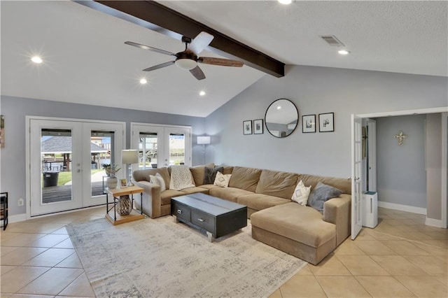 living area with french doors, visible vents, lofted ceiling with beams, light tile patterned flooring, and baseboards