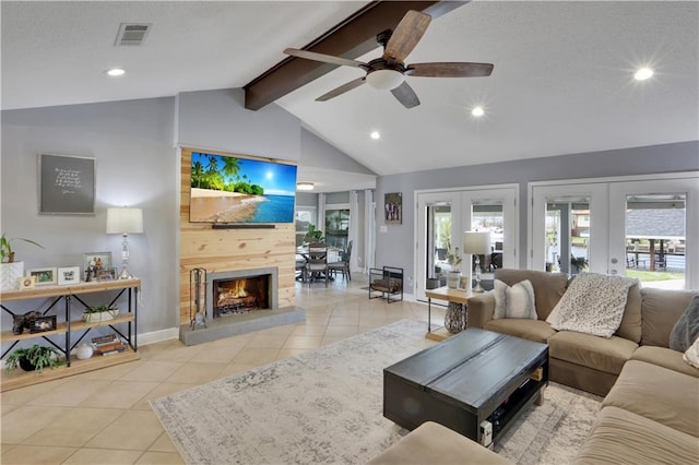 living room featuring french doors, visible vents, tile patterned flooring, beamed ceiling, and a tile fireplace