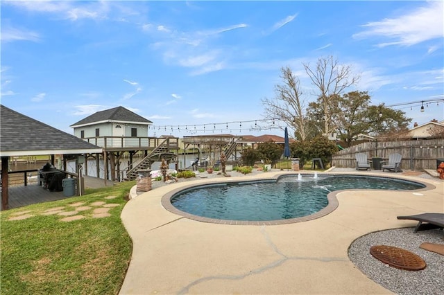 view of pool featuring a fenced in pool, a patio area, and fence