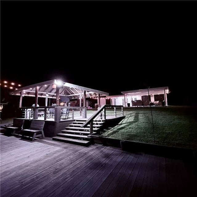 view of dock featuring a wooden deck and a gazebo