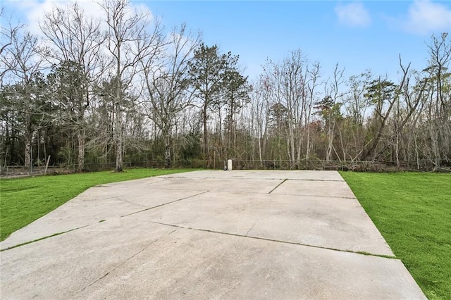 view of patio / terrace featuring fence