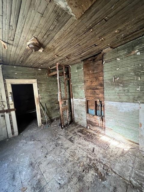 miscellaneous room with wood ceiling