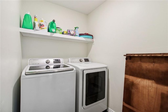 laundry room with laundry area and separate washer and dryer