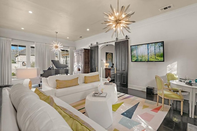 living area featuring visible vents, an inviting chandelier, recessed lighting, crown molding, and a barn door