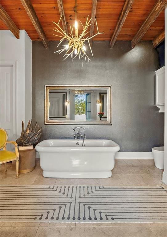 bathroom with a soaking tub, wooden ceiling, beamed ceiling, and tile patterned flooring
