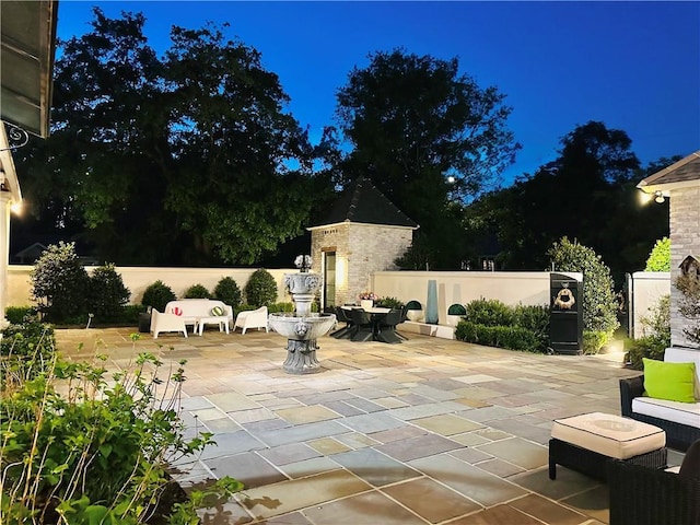 patio at night with fence