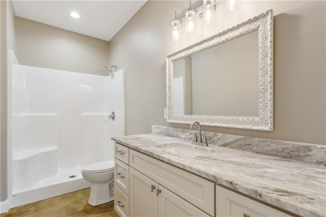 full bath with a shower, vanity, and toilet