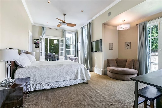 carpeted bedroom with access to outside, ornamental molding, and baseboards