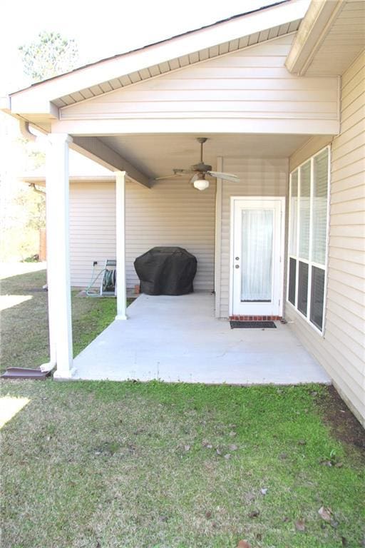 view of patio / terrace featuring ceiling fan and grilling area