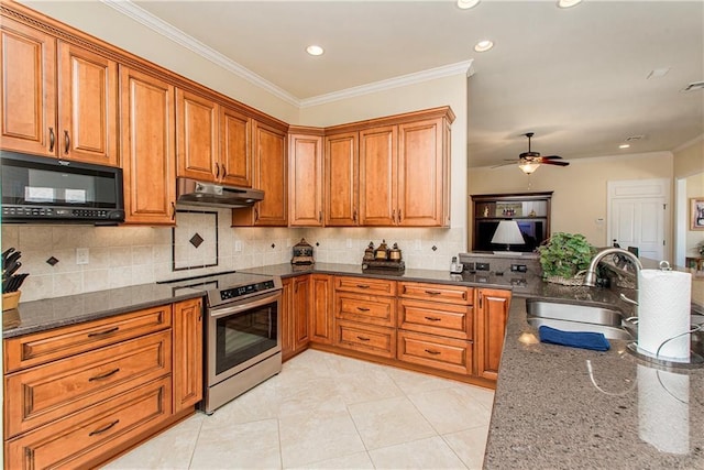 kitchen with brown cabinetry, stainless steel electric range oven, under cabinet range hood, black microwave, and a sink