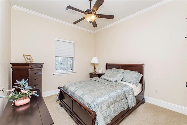 bedroom with ornamental molding, light colored carpet, ceiling fan, and baseboards