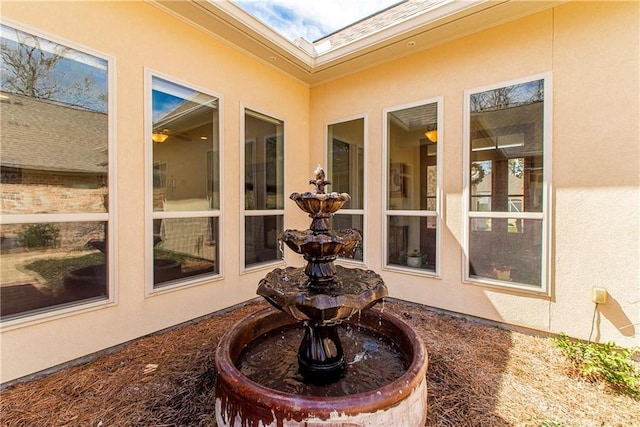 sunroom / solarium with a skylight