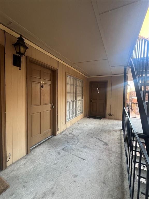 entrance to property featuring a balcony